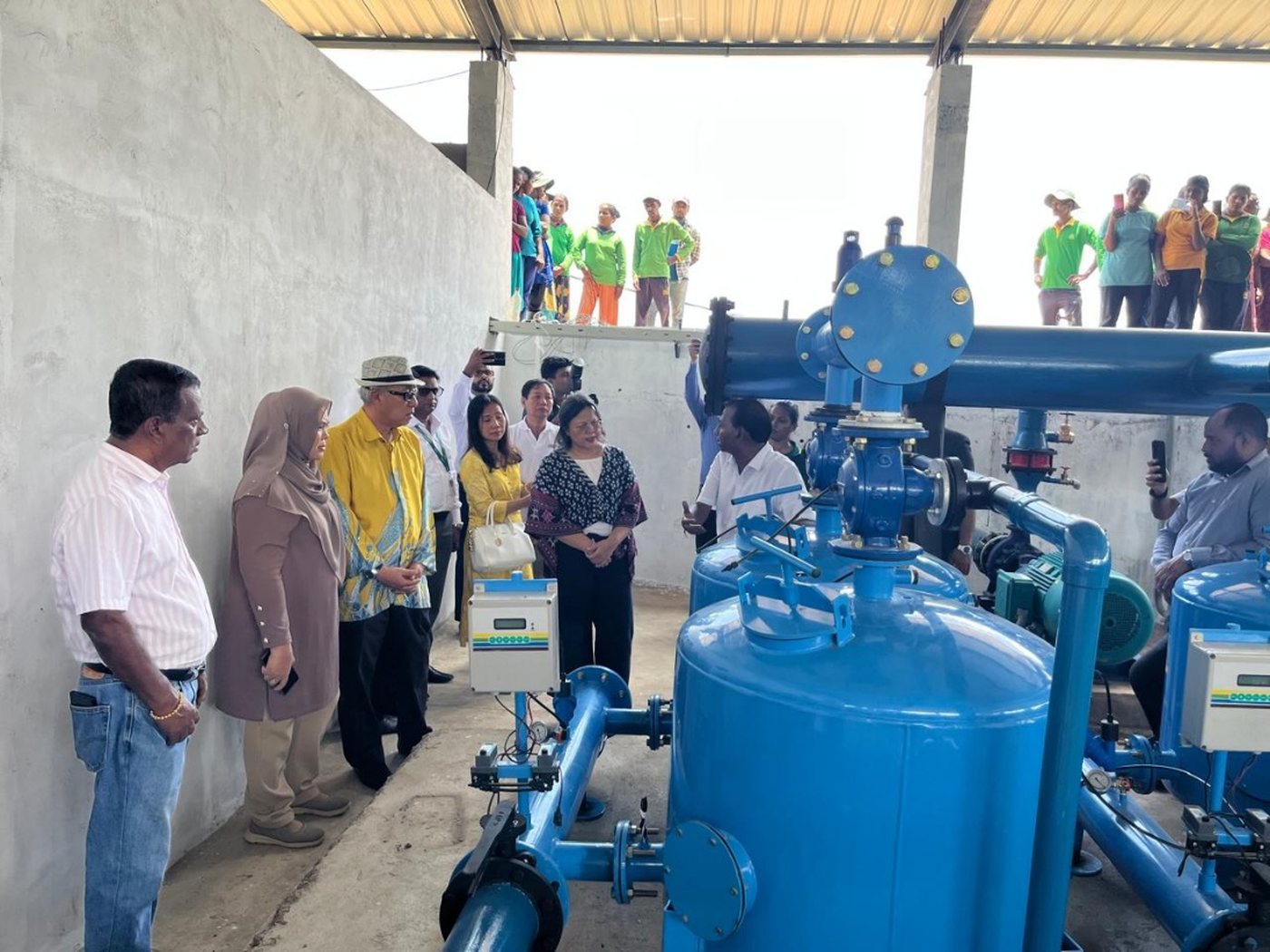 Officials and partners touring the commissioned Nelna Agri headworks